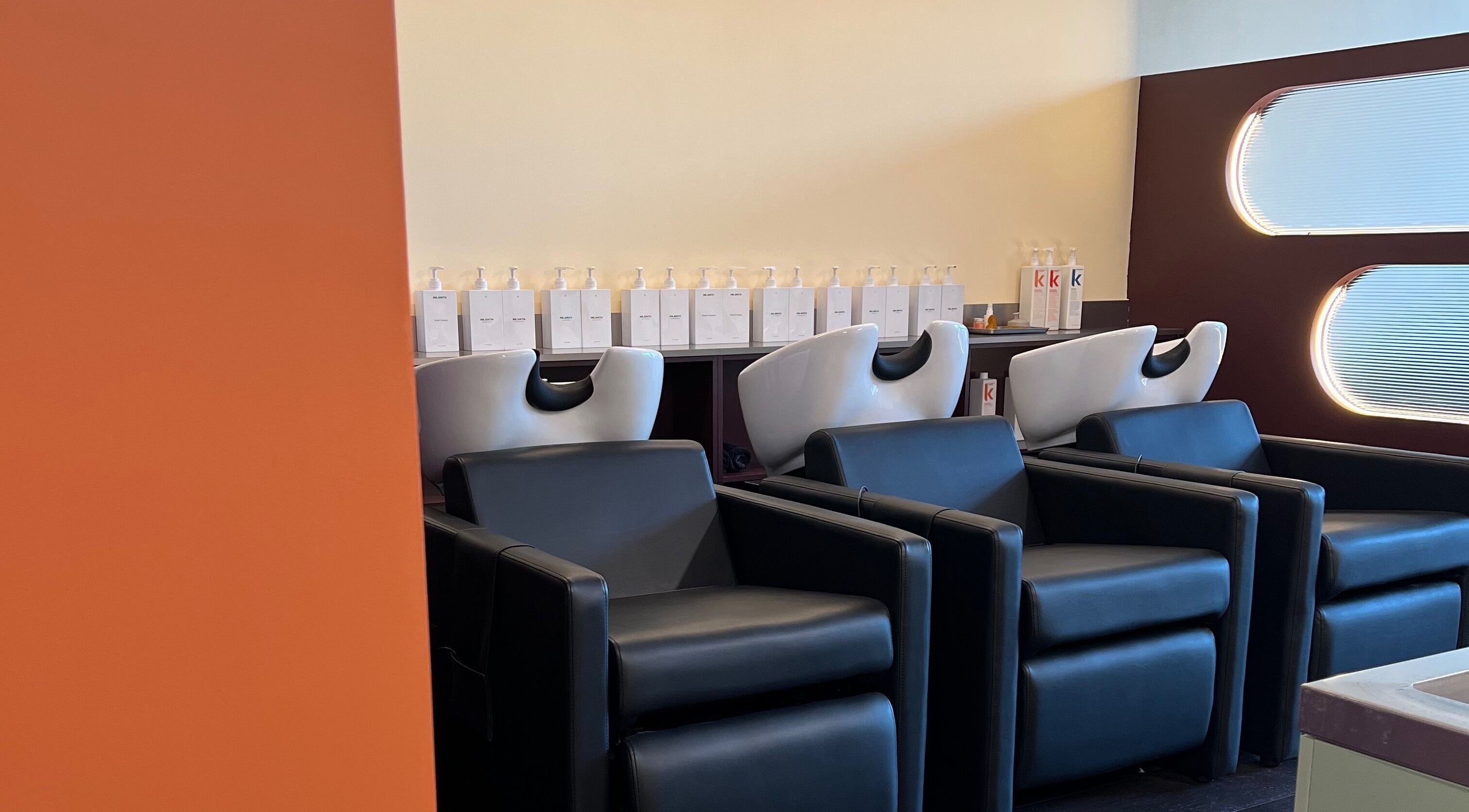 Modern shampoo chairs at Salon Spaghetti, Melbourne, Victoria, AU offering premium hair care.