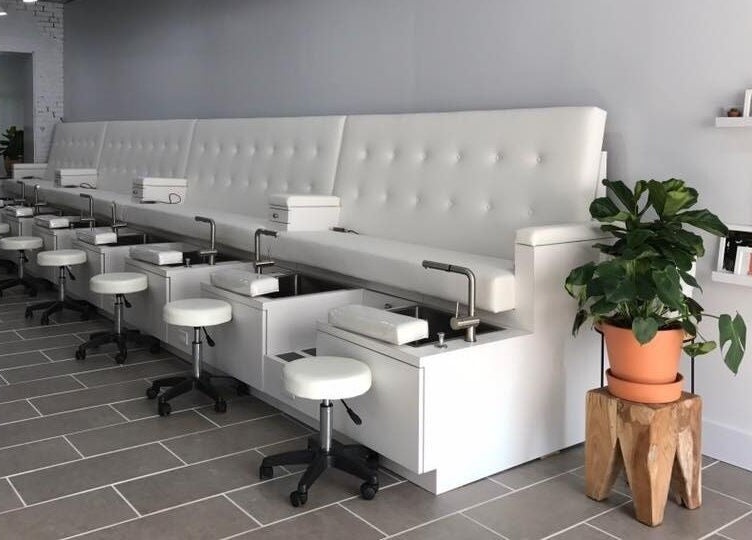 Elegant seating and decor at Top Coat Nail Studio in Bryn Mawr, Pennsylvania, US.