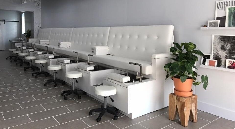 Elegant seating and decor at Top Coat Nail Studio in Bryn Mawr, Pennsylvania, US.