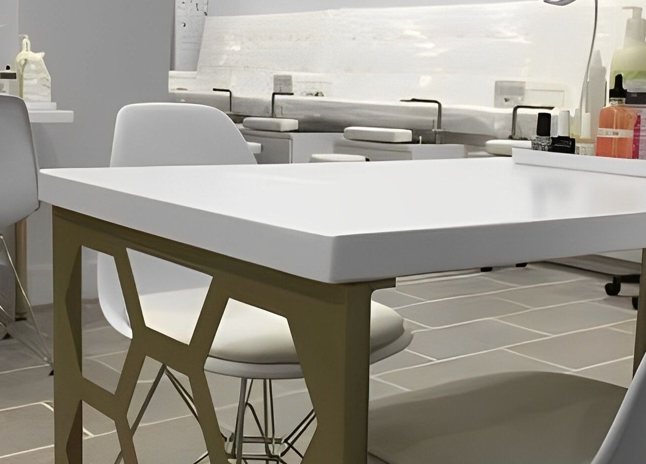 Modern nail station at Top Coat Nail Studio in Bryn Mawr, Pennsylvania, US, featuring sleek design and comfortable seating.