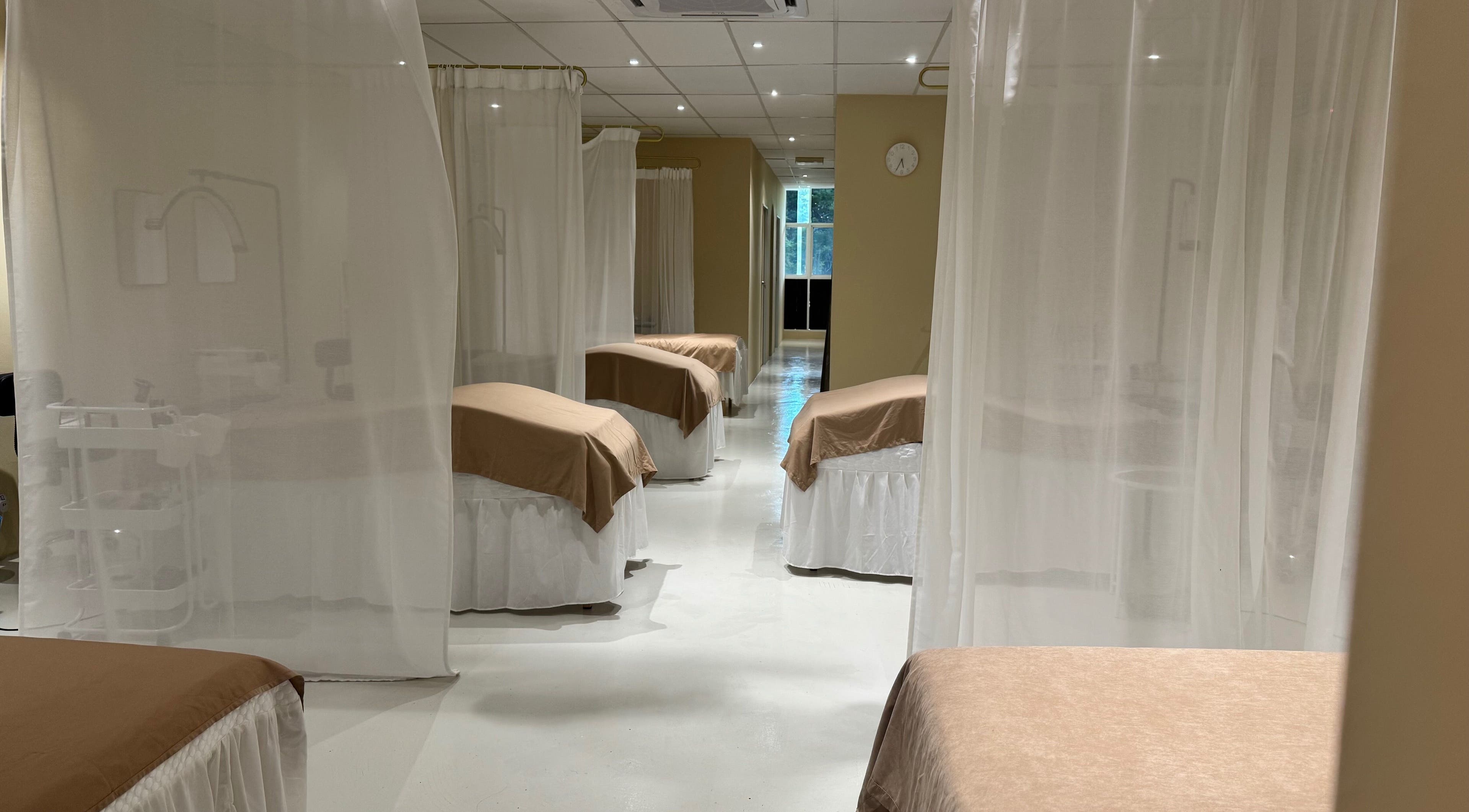 Luxurious treatment beds at Lash Lift Haven - Ara Damansara, Petaling Jaya, Selangor, MY with elegant sheer curtains.