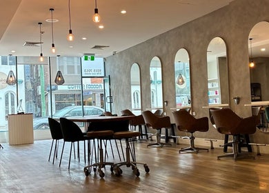 Elegant salon space at Coogee Hair & Body Boutique in Coogee, New South Wales, AU, showcasing modern decor.