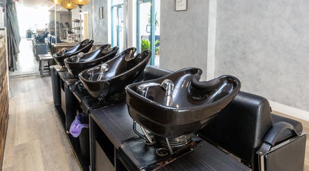 Sleek wash stations at Coogee Hair & Body Boutique, Coogee, New South Wales, AU.