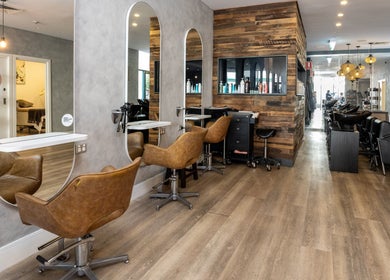 Coogee Hair & Body Boutique in Coogee, New South Wales, AU features stylish salon chairs and modern decor.