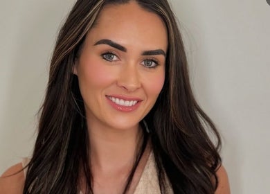 Woman with radiant smile at By Your Girl Emma, Melbourne, Victoria, AU showcasing beauty and wellness.