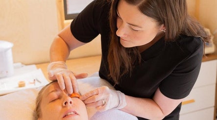 Professional facial treatment at Bloom Boutique Beauty, Dunedin, Otago, NZ highlighting skilled care.