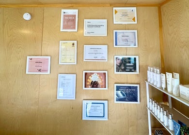 Certificates and products on display at Bloom Boutique Beauty, Dunedin, Otago, NZ.