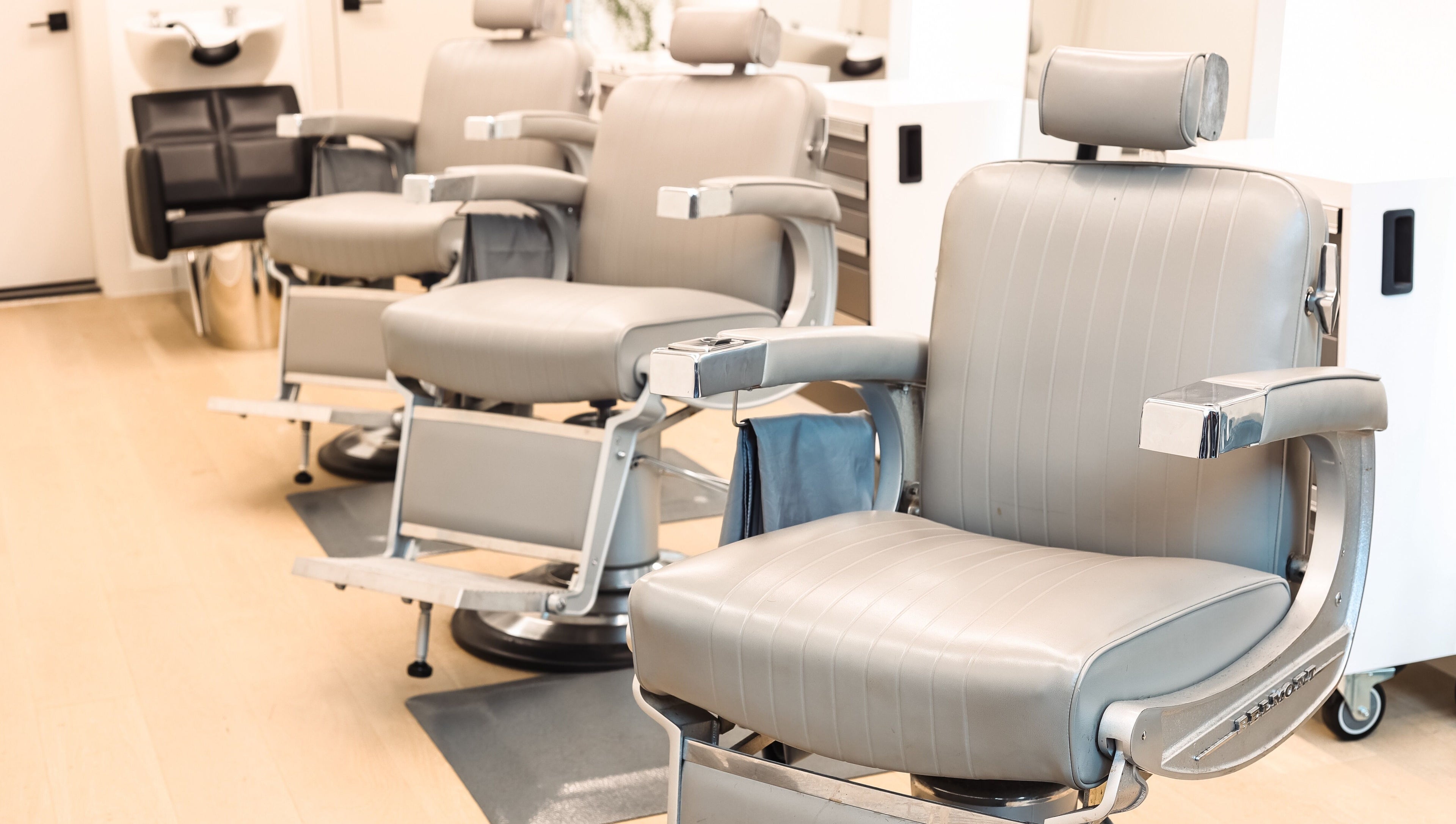 Modern salon chairs at CABELLO BROOKLYN, New York, New York, US. Comfortable setting for a premium experience.