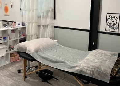 Calm esthetic room at True North Esthetics in Terrace Bay, Ontario, CA, with a treatment bed and soothing decor.