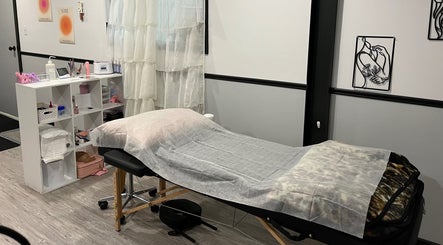 Calm esthetic room at True North Esthetics in Terrace Bay, Ontario, CA, with a treatment bed and soothing decor.