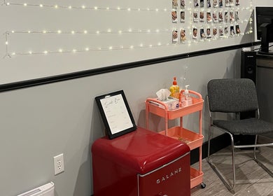 Cozy corner at True North Esthetics in Terrace Bay, Ontario featuring a snack bar and comfortable seating.