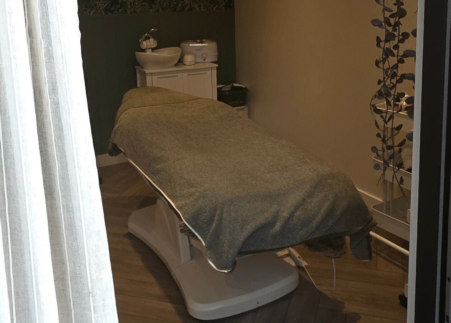 Cozy treatment room at Nicola's Nails and Beauty, Whitchurch, England, GB. Inviting space with tranquil ambiance.