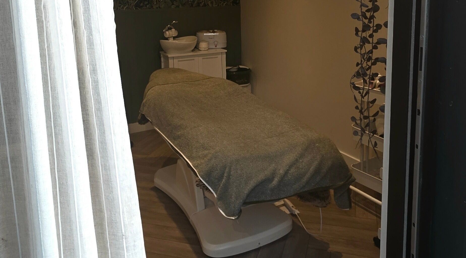 Cozy treatment room at Nicola's Nails and Beauty, Whitchurch, England, GB. Inviting space with tranquil ambiance.