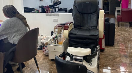Relax in Glammy Beauty's premium spa chair in London, England, GB, surrounded by wellness essentials.
