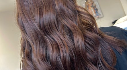 Rich brown wavy hair styled at Prestige Hair Salon, Chippenham, England, GB.