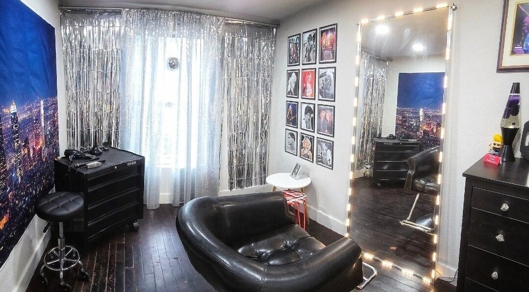 Chic salon interior at Jonny Styles, Austin, Texas, US with a large mirror and modern decor.