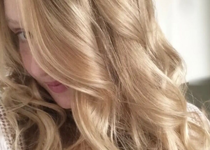 Blonde hair styled to perfection at Jonny Styles, Austin, Texas, US salon.