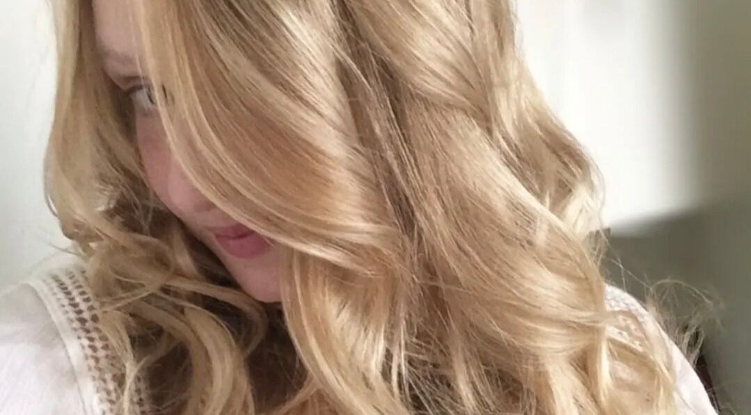 Blonde hair styled to perfection at Jonny Styles, Austin, Texas, US salon.