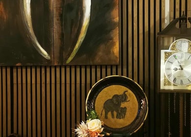 Decorative elephant plate and wall art at Chang Thai Massage, Ipswich, Queensland, AU for a serene atmosphere.