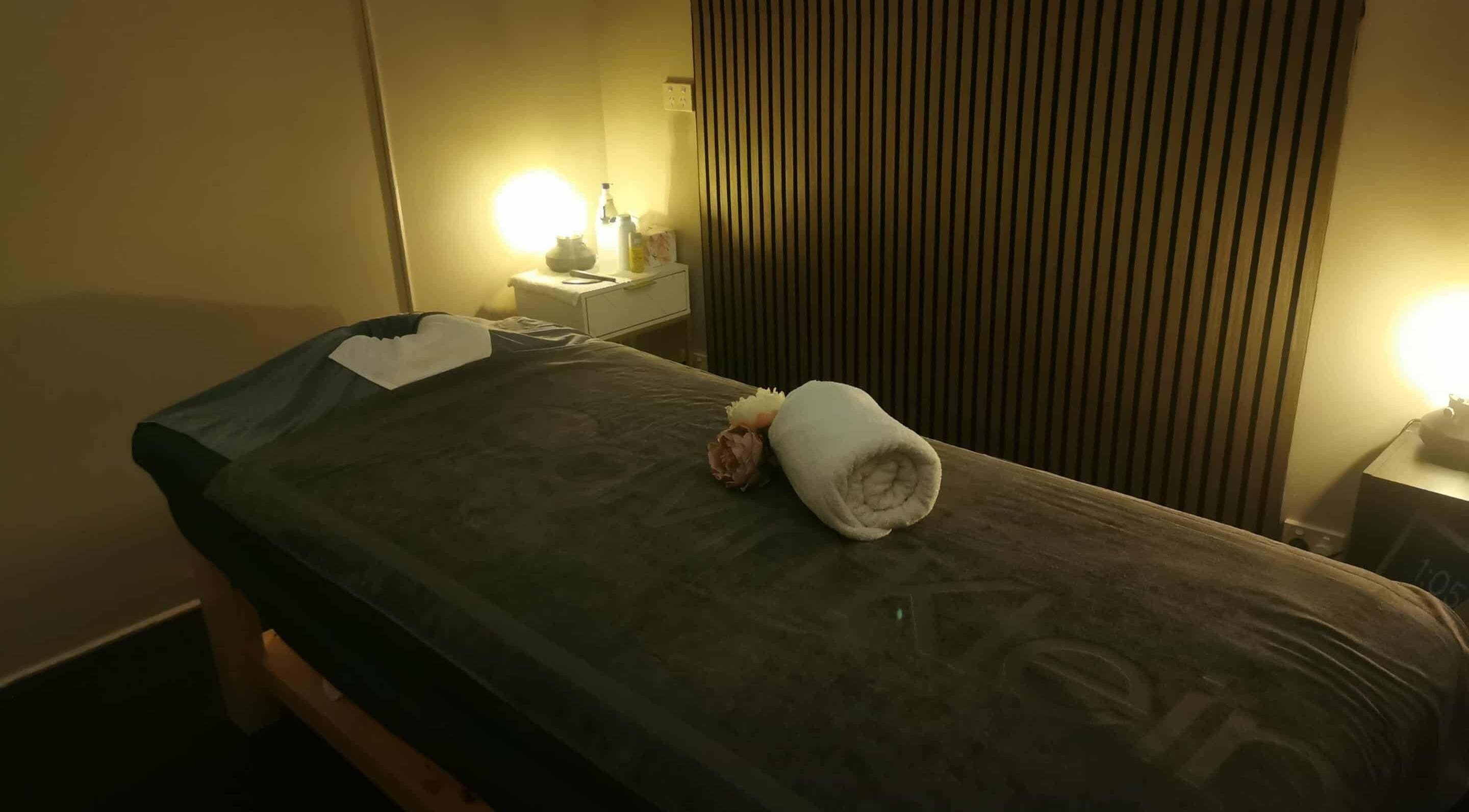 Cozy massage room at Chang Thai Remedial Massage, Ipswich, Queensland, AU with dim lighting and soft towels.