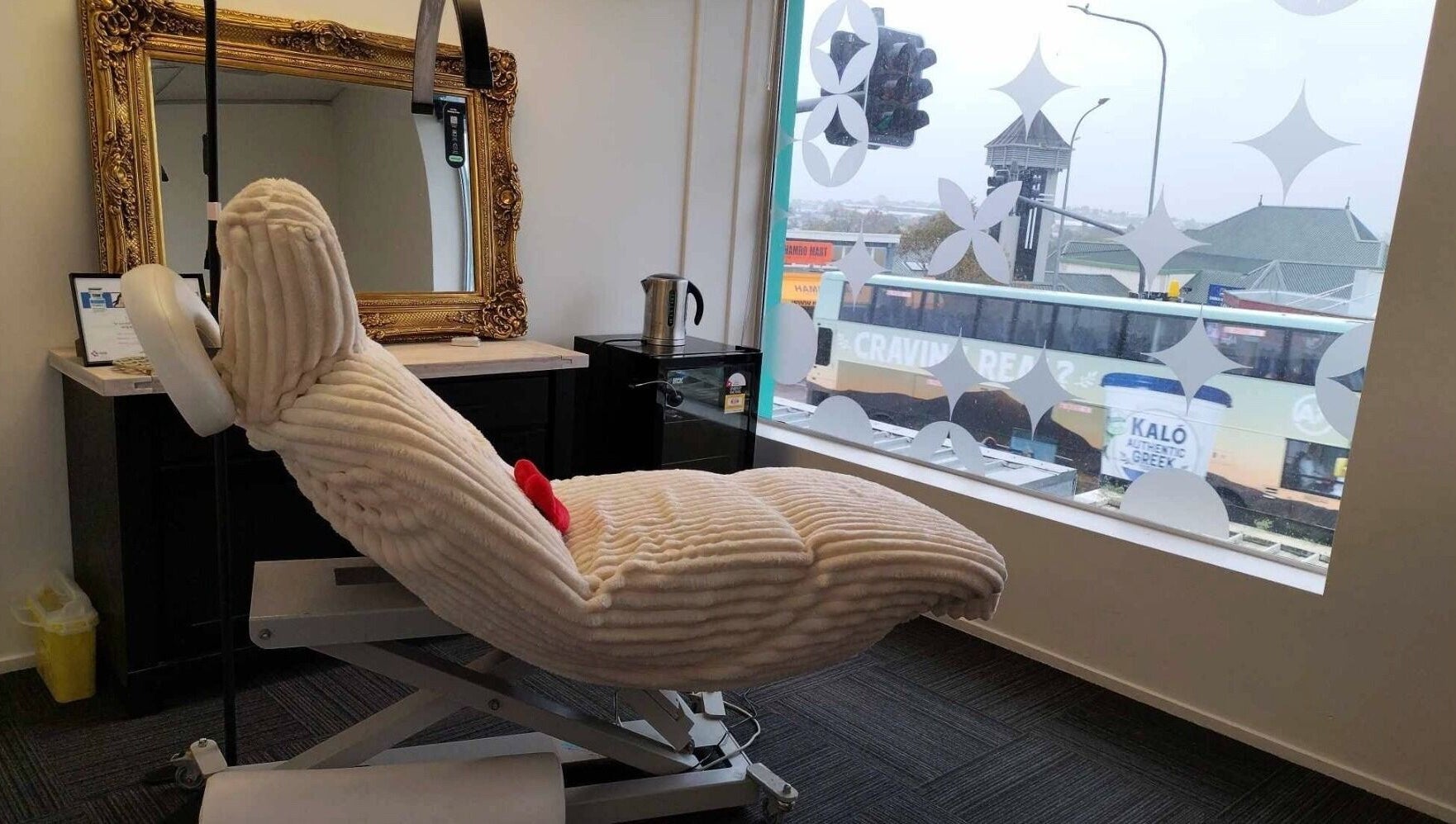 Luxurious spa room with plush chair and elegant decor at Viva Clinics, Auckland, Auckland, NZ.