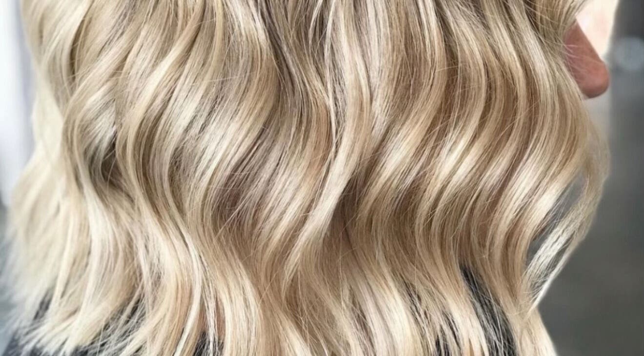 Blonde wavy hair styled at Funk Hair Studio, Albion Park, New South Wales, AU.