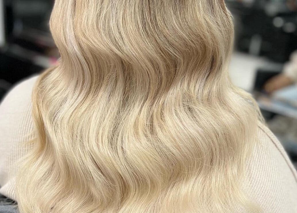 Elegant blonde waves styled at Funk Hair Studio in Albion Park, New South Wales, AU.