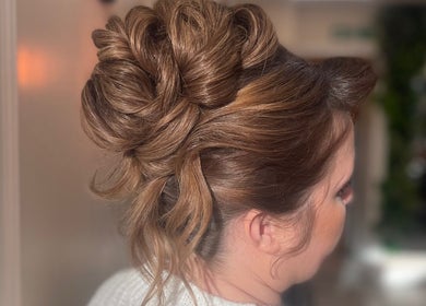 Sophisticated updo at Aimee Rose Hair in Stockton-on-Tees, England, GB, showcasing exquisite styling.
