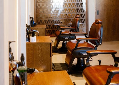Classic barber chairs at Tribes Men's Spa & Salon (Mazoon st) in Muscat, Muscat Governorate, OM.
