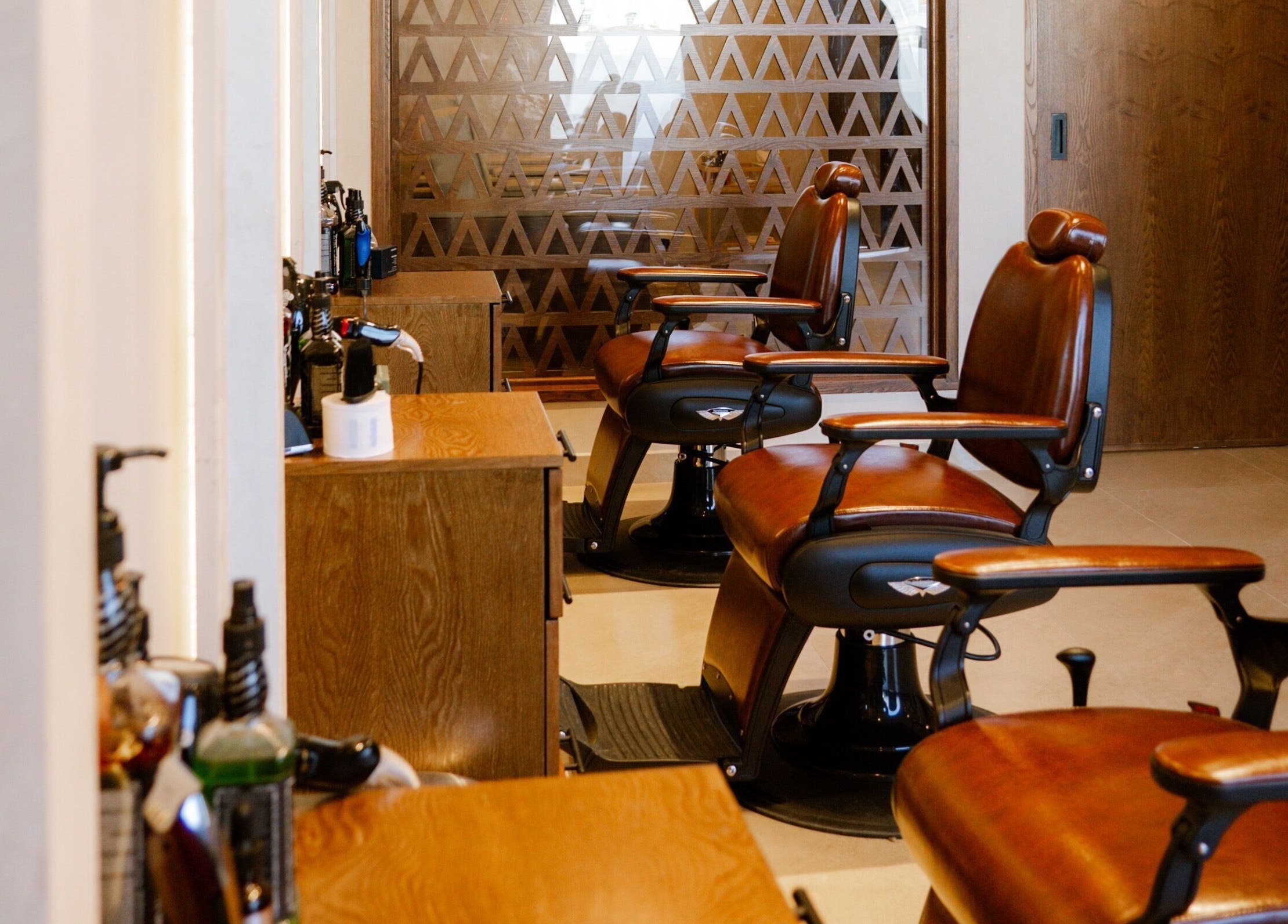 Luxurious barber chairs at Tribes Men's Spa & Salon (Mazoon st), Muscat, Muscat Governorate, OM.