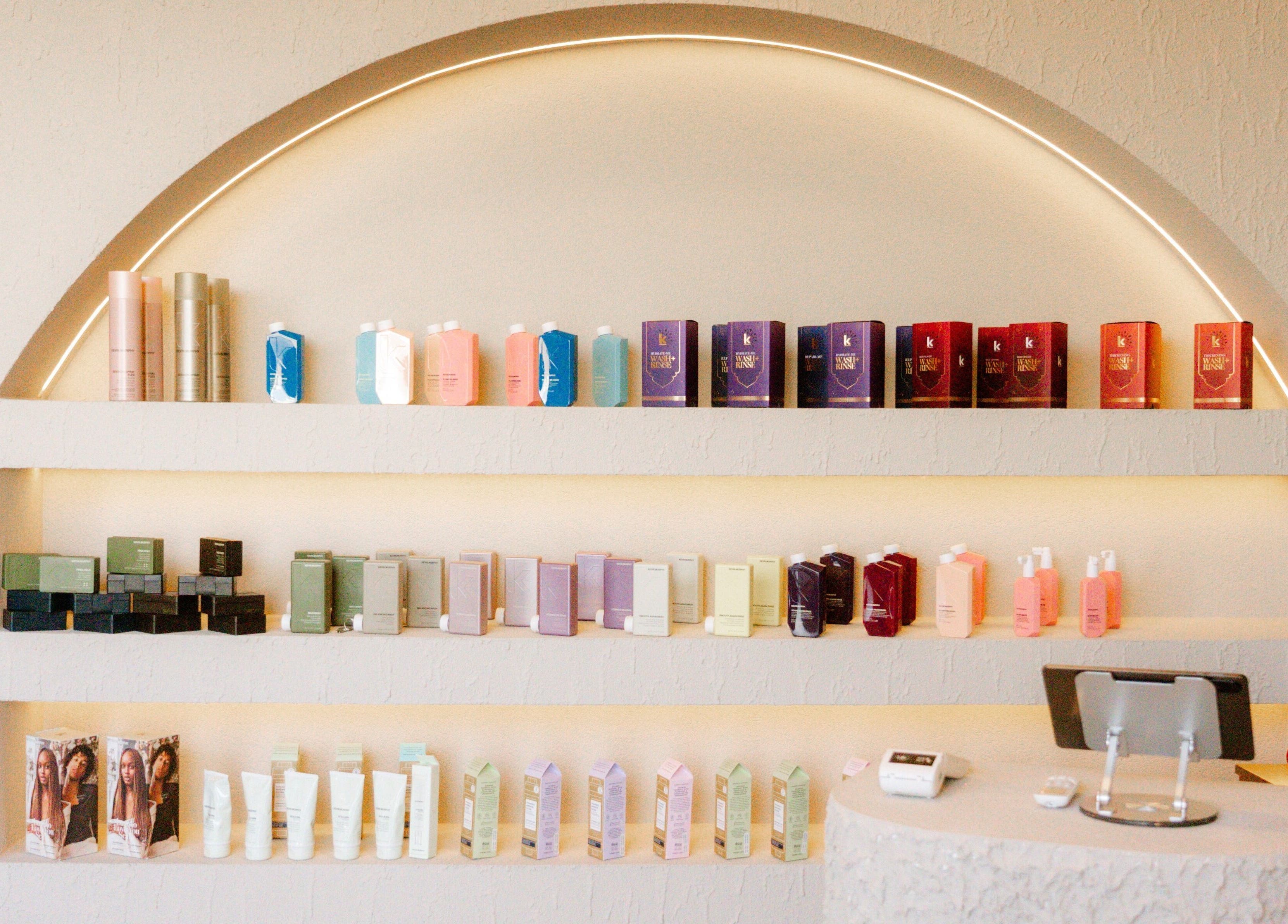 Elegant product shelves at Tribes Men's Spa & Salon (Mazoon st) in Muscat, Muscat Governorate, OM.