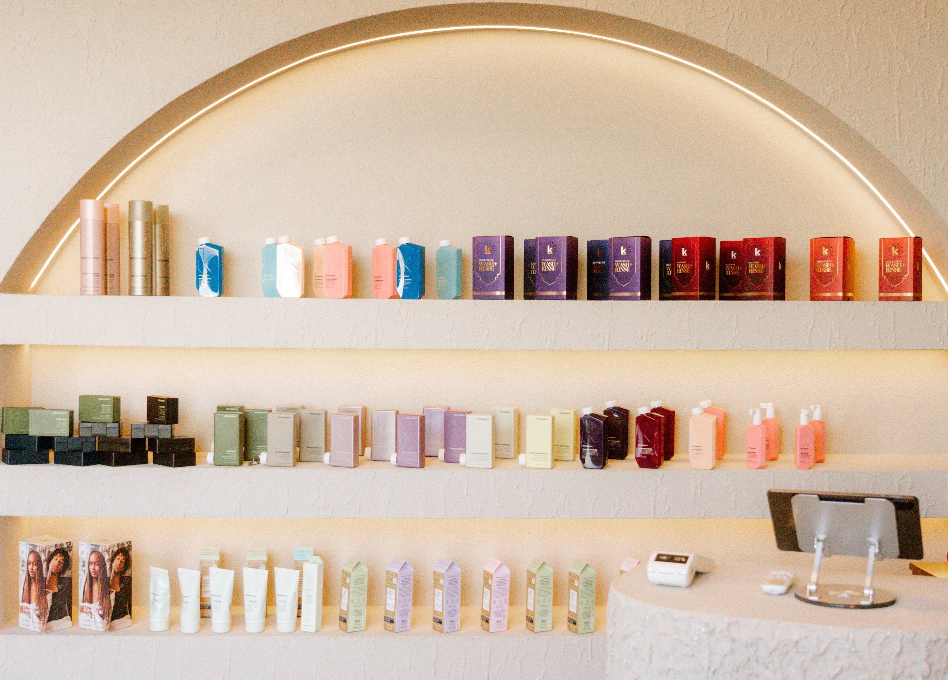 Elegant product shelves at Tribes Men's Spa & Salon (Mazoon st) in Muscat, Muscat Governorate, OM.