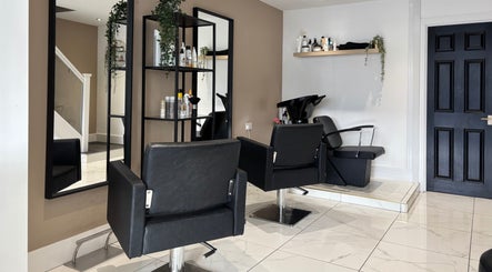 Stylish salon at Picture Me Prestige, Hyde, England, GB with sleek chairs and modern decor.
