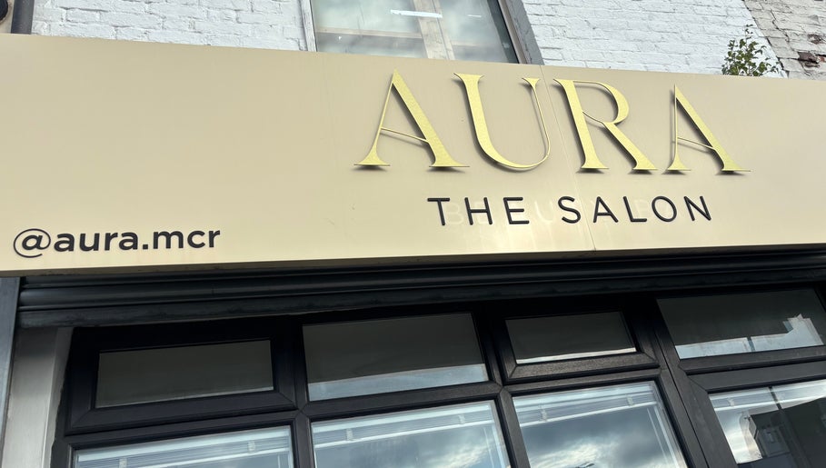 Front view of Aura Salon, near Picture Me Prestige, Hyde, England, GB, showcasing elegant signage.