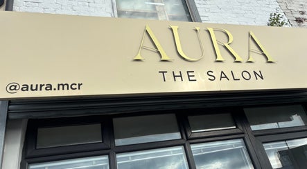 Front view of Aura Salon, near Picture Me Prestige, Hyde, England, GB, showcasing elegant signage.
