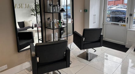 Modern salon interior at Picture Me Prestige with sleek chairs, Hyde, England, GB.