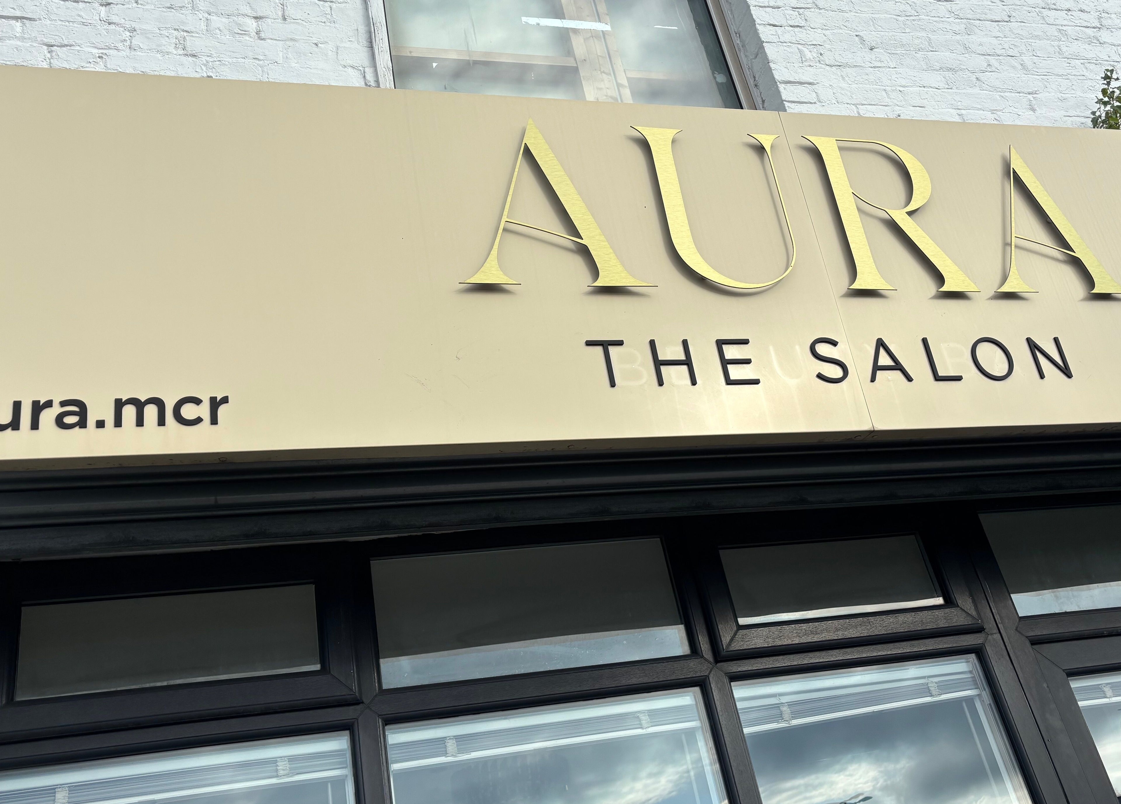 Picture Me Prestige salon sign on Hyde street, England, GB showcasing the entrance of the beauty venue.