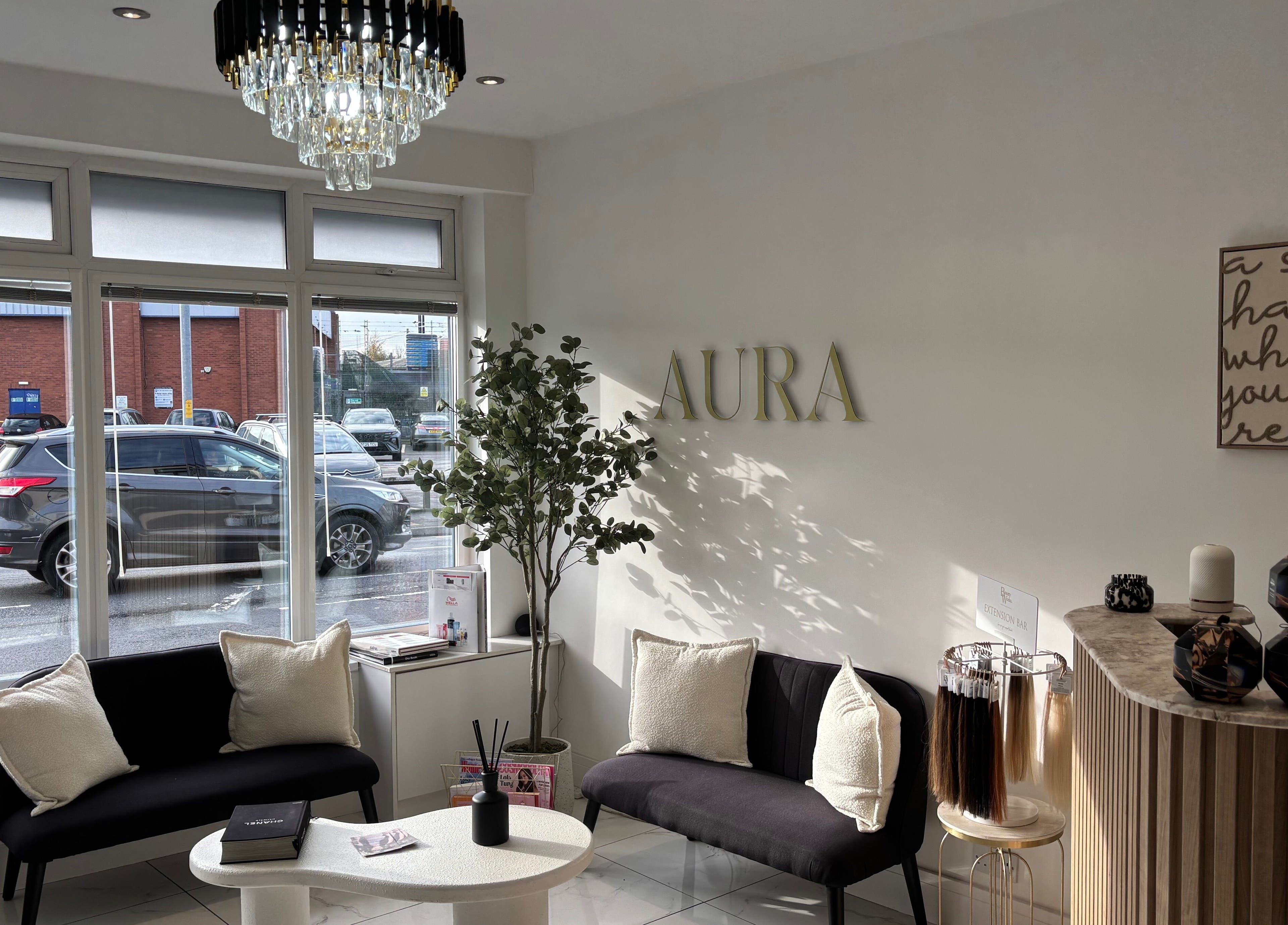 Elegant lounge at Picture Me Prestige, Hyde, England, GB with chic seating and decor under a modern chandelier.