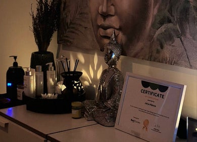 Serene massage room at Thai Massage Greenock, Greenock, Scotland, GB with Buddha statue and calming decor.