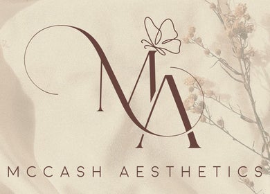 Elegant logo for McCash Aesthetics in Yeovil, England, GB featuring graceful lettering and floral accents.