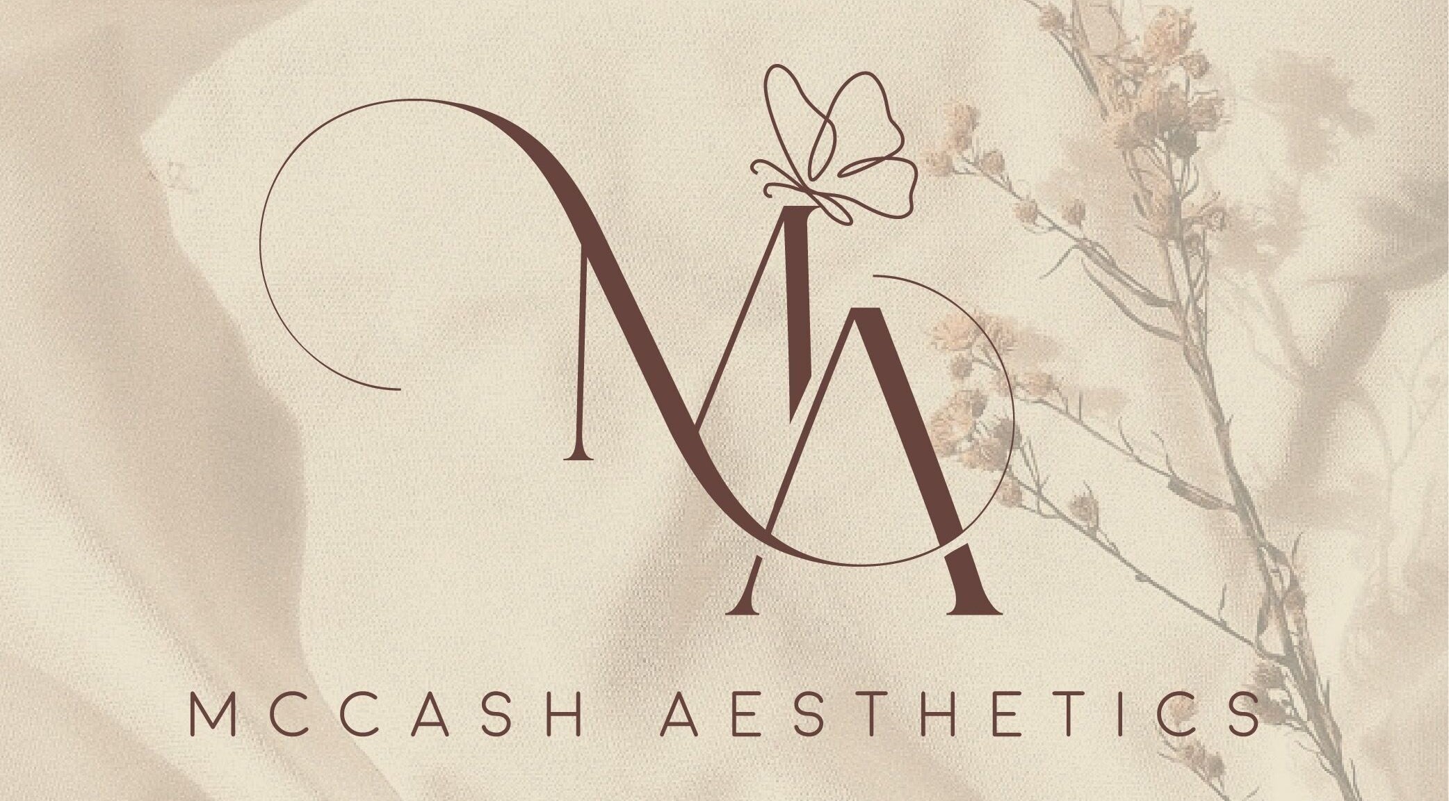 Elegant logo for McCash Aesthetics in Yeovil, England, GB featuring graceful lettering and floral accents.