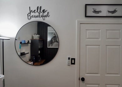 Kendra salon interior with chic decor and mirror in Downey, California, US.