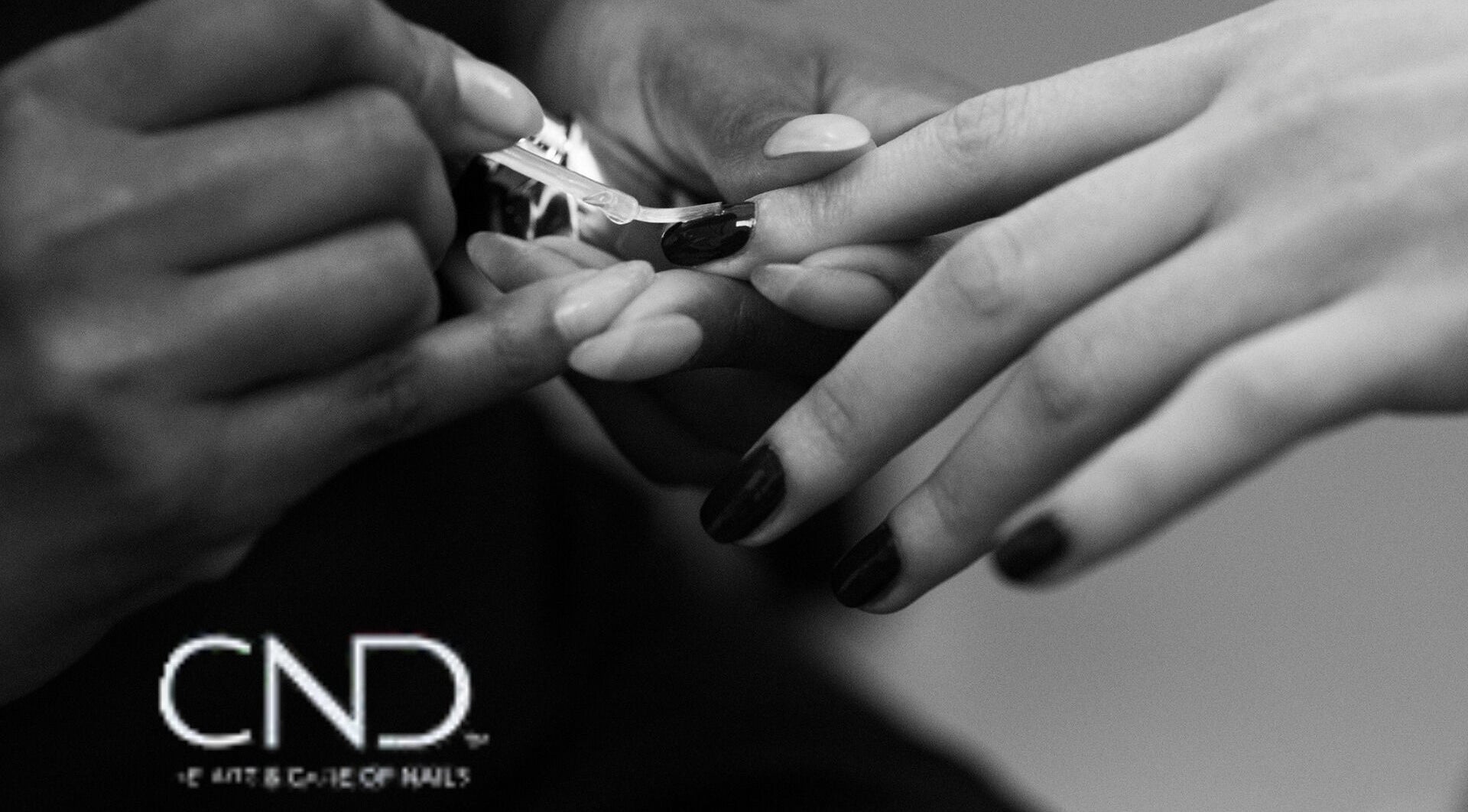 Nail technician applying polish at Shreen Gayle Works, Wallington, England, GB.