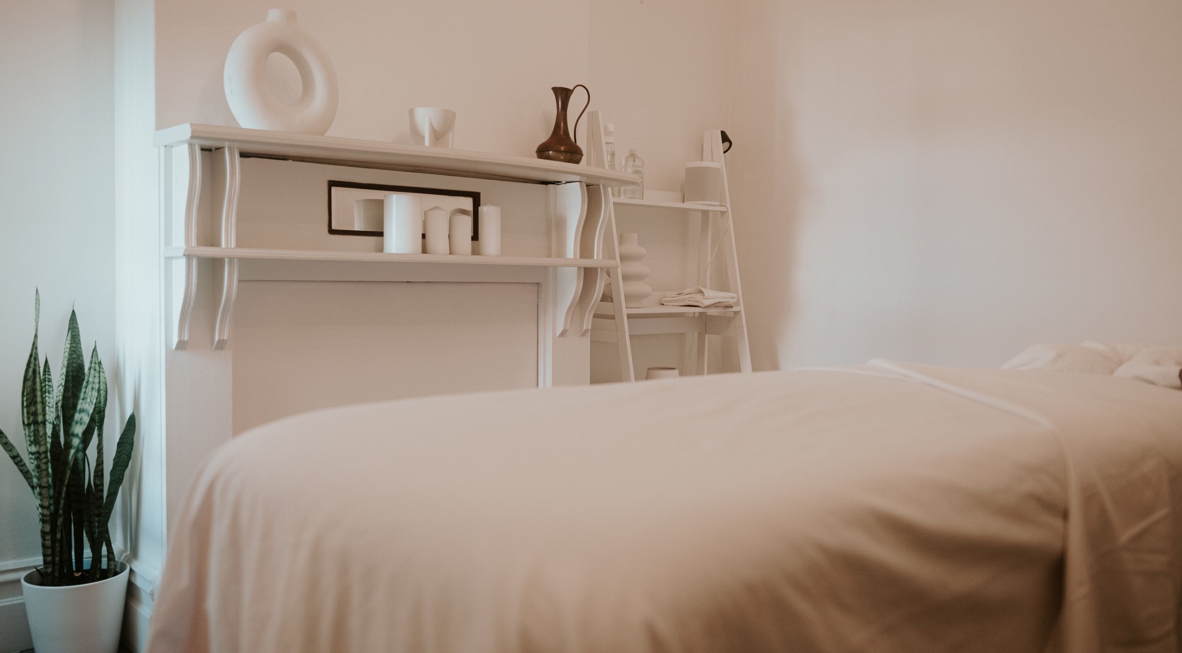 Tranquil spa room at Nagomi Wellness, Melbourne, Victoria, AU with elegant decor and soothing ambiance.