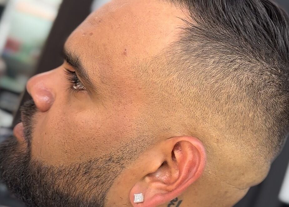 Detailed close-up of sharp fade hairstyle at THE LOCO BARBER BALI, Bali, Bali, ID.