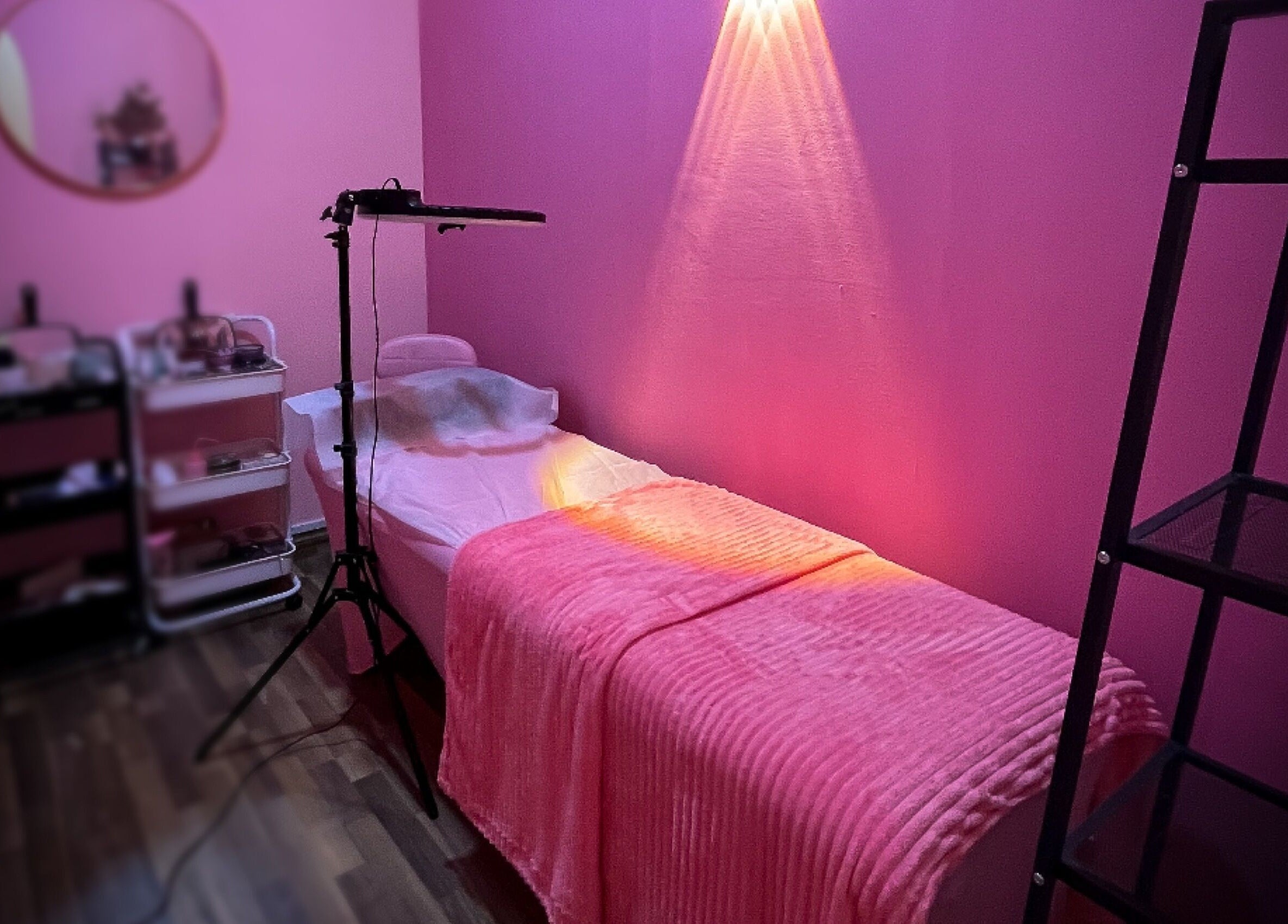 Eyelash by Tasha treatment room in Petaling Jaya, Selangor, MY, featuring a pink-themed decor and cozy ambiance.