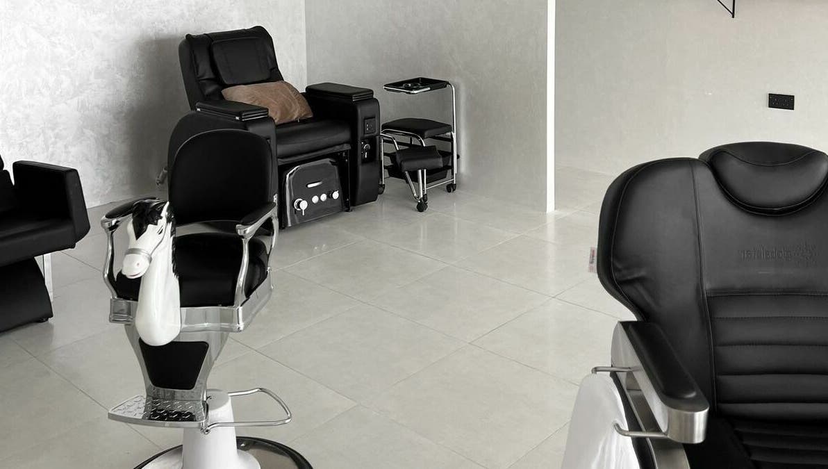 Modern barber chairs at Kev Lounge Barber, Umm Al Quwain, Emirate Of Umm Al Quwain, AE.