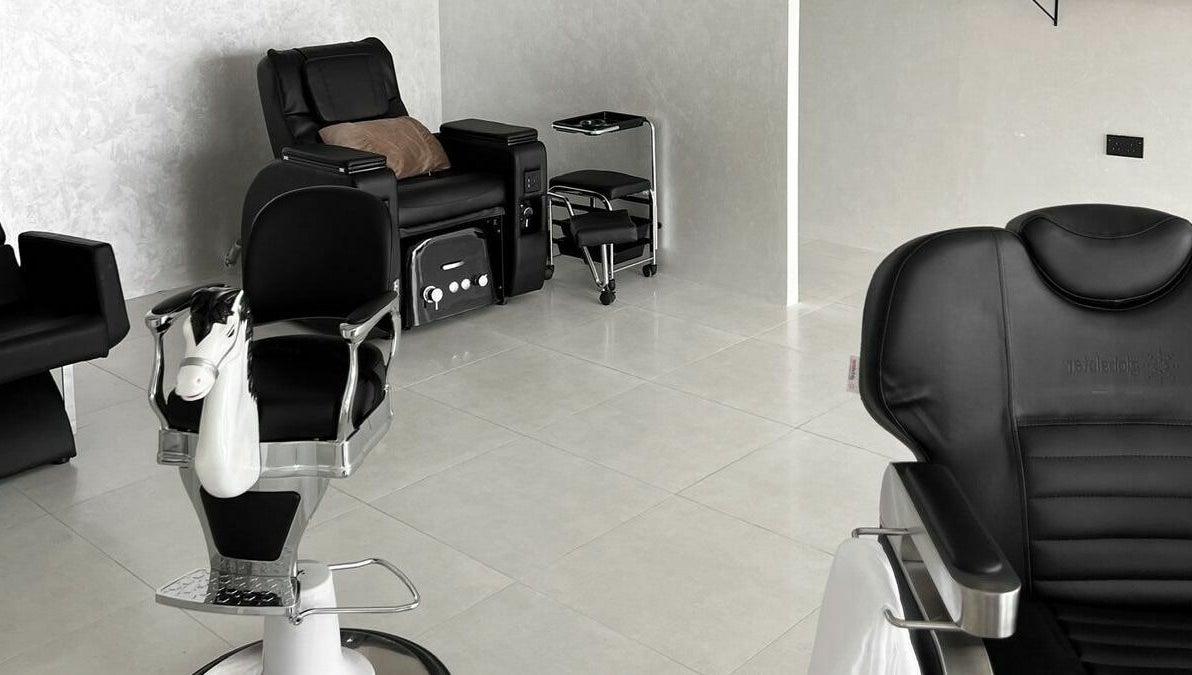 Modern barber chairs at Kev Lounge Barber, Umm Al Quwain, Emirate Of Umm Al Quwain, AE.