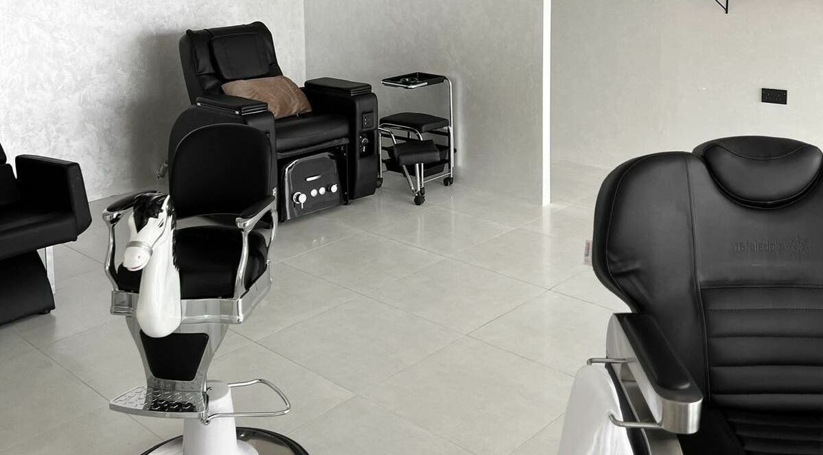 Modern barber chairs at Kev Lounge Barber, Umm Al Quwain, Emirate Of Umm Al Quwain, AE.