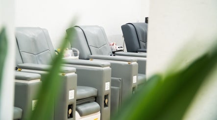 Relaxing pedicure chairs at Lush & Glow spa, Singapore, Singapore, SG offering a tranquil ambiance.